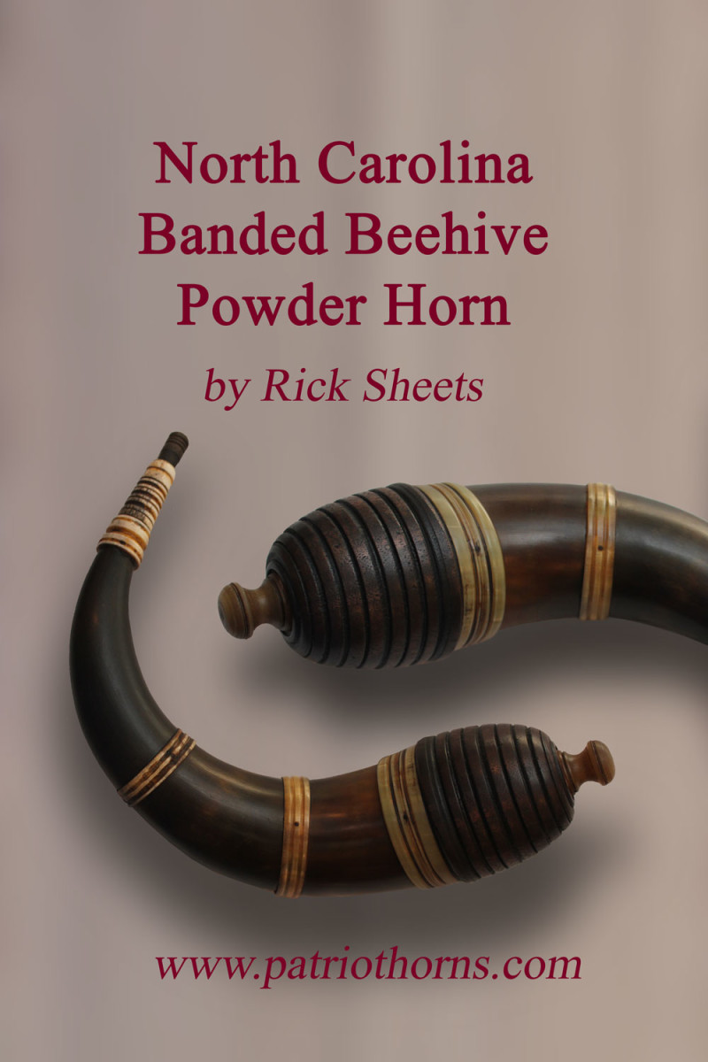 This is my version of a beehive powder horn made in an antique style. It is small with a dramatic double curve shape.